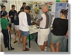 Keen Seagrass Watch volunteers examine the display material to gain a better understanding of the different morphology of species found around Townsville. 